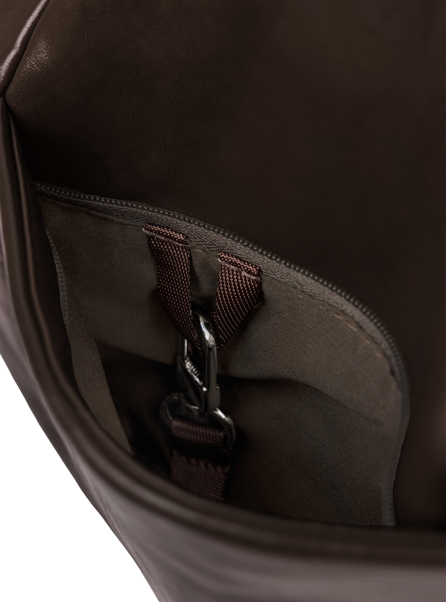 Exterior pocket of the Midi Arc hobo-style bag in dark brown vegan leather, with concealed snap loop