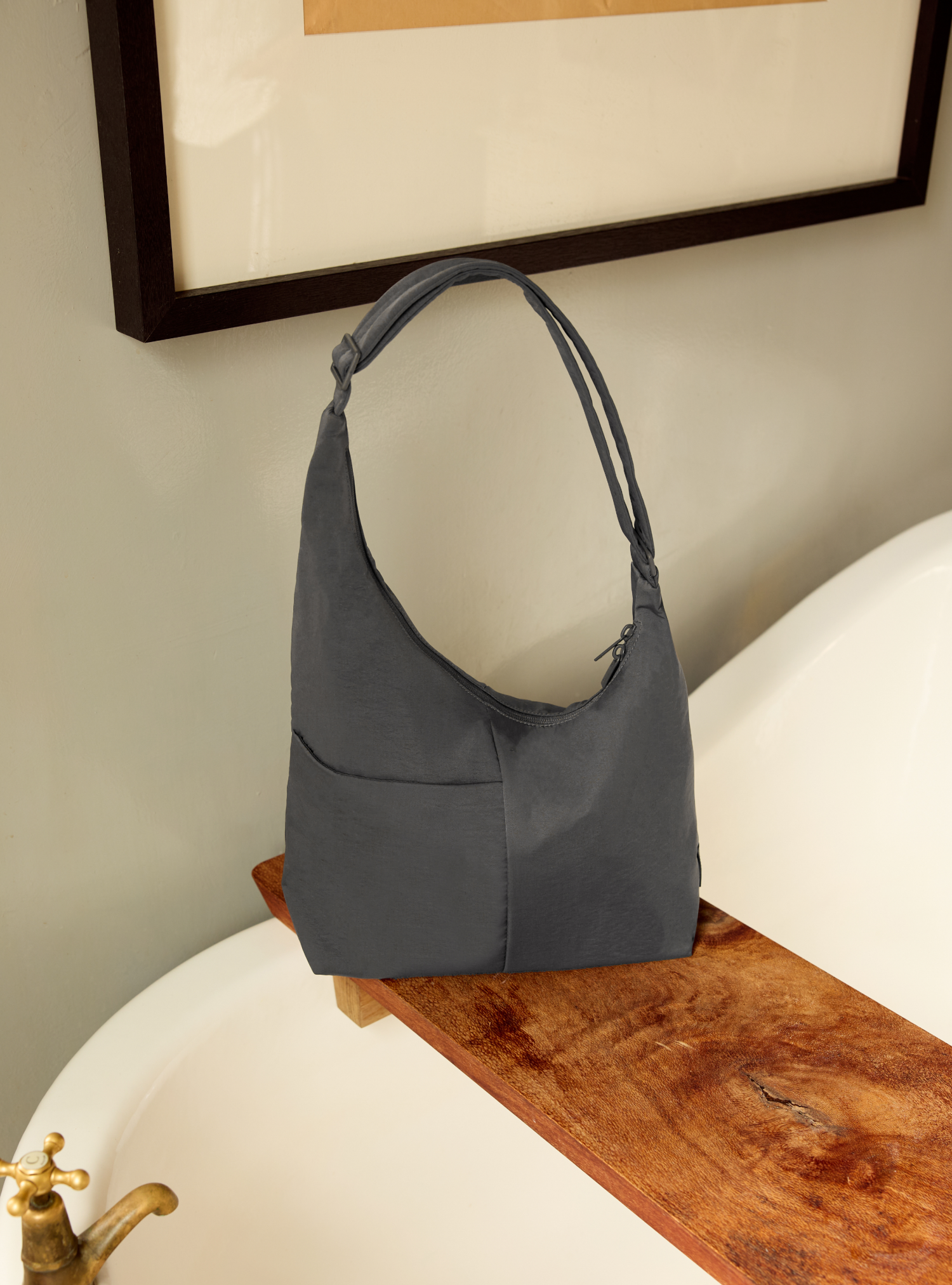 The Midi Arc slouchy hobo bag in dark grey nylon for work, travel and everyday use