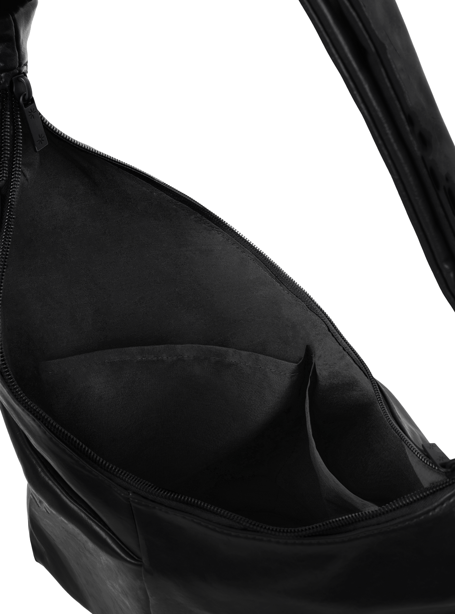 Interior of the Midi Arc hobo-style bag in matte black vegan leather, with multiple pockets